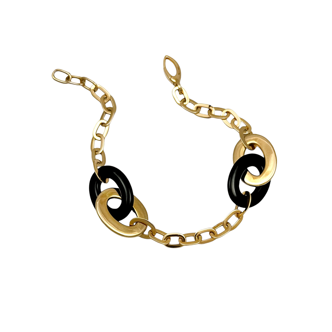 34423.gif Bracciale in oro rosa e onice